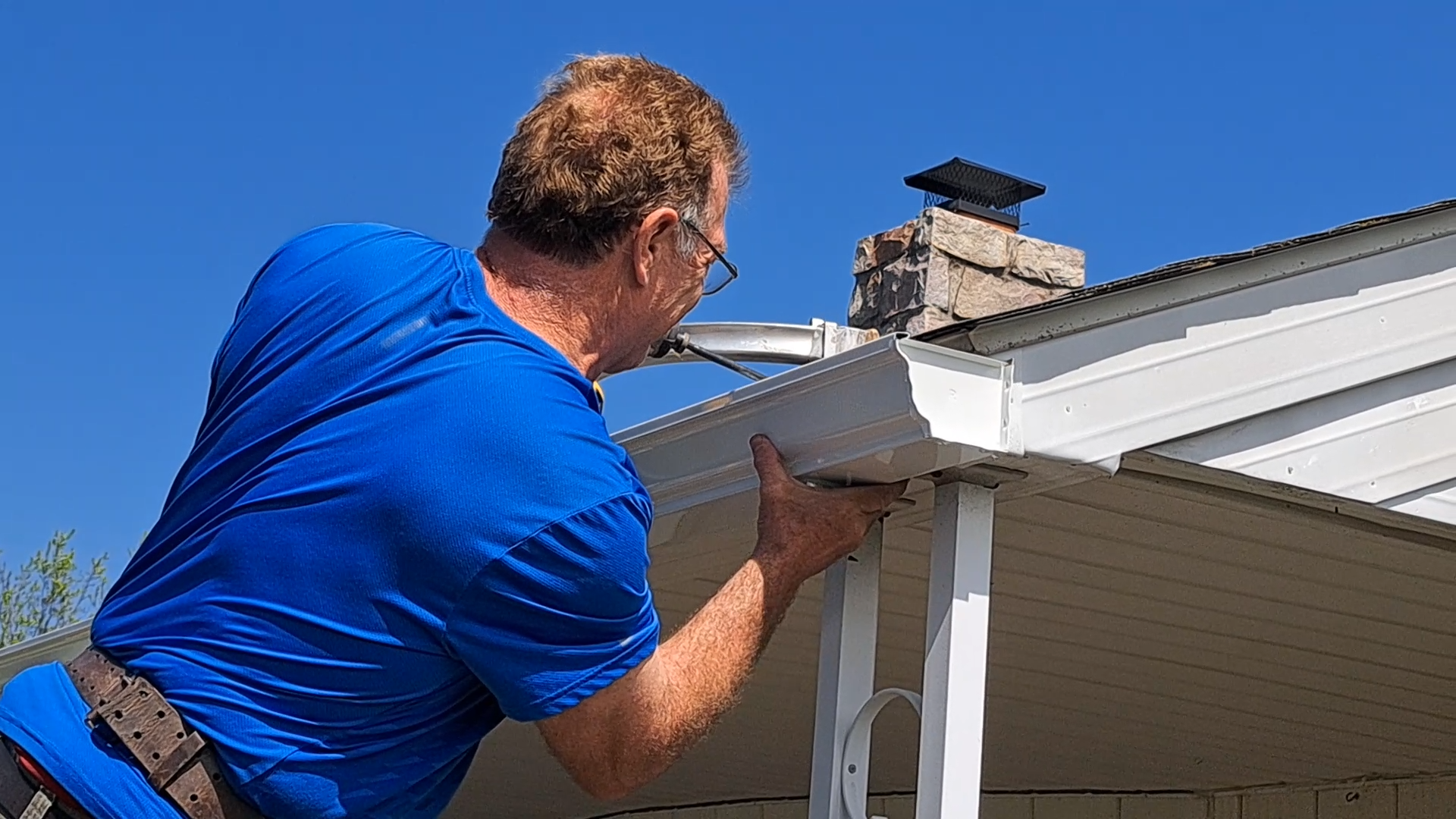 Ed Reitz installing seamless gutters