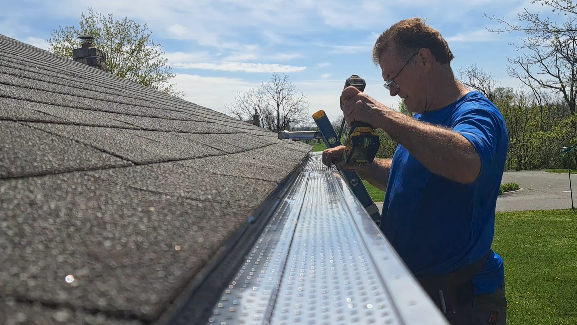 Ed installing gutter guards
